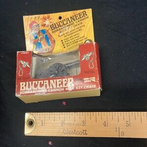 Buccaneer Bombardment Cannon Key Chain - Red & Yellow Packaging